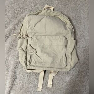Cream Canvas Backpack with Minimalist Design